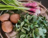 A picture of step 1 of Spring onion, Methi and Alu sabzi.
