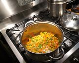 A picture of step 4 of Porotos con Riendas with Smoked Ham.