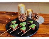 A picture of step 7 of Christmas Tree Brownie Pops.