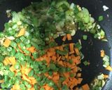 A picture of step 3 of Fried rice-a chinese dish served with manchurian.