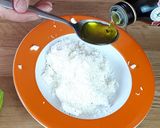 Foto del passaggio 5 della ricetta Fiori di zucca ripieni alla feta, melanzane e menta