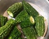 A picture of step 1 of Bharwa karele.