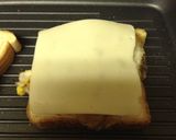 A picture of step 8 of Grilled Sausage Fried Egg And Cheese.