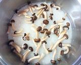 A picture of step 2 of Rice Cooked with Dried Shimeji Mushrooms.