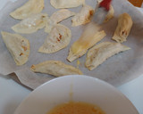 Foto del paso 5 de la receta: Empanadillas de relleno de calamar y carne
