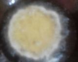 A picture of step 2 of Coconut malpua.