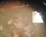 A picture of step 1 of Collards in chicken stock.