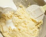 A picture of step 4 of Easy and Fluffy Vanilla and Chocolate Muffins.