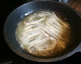 Foto del paso 3 de la receta: Boquerones fritos con pimientos de Padrón