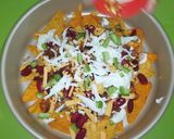 A picture of step 7 of Loaded Cheesy nachos.