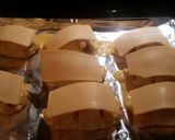A picture of step 7 of Double Cheesey Loaded Crescent Dogs.