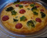 A picture of step 3 of Broccoli and Tomato Christmas Flan.