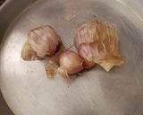 Foto del paso 1 de la receta: Pan integral de ajo confitado