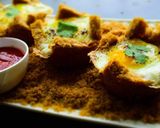 A picture of step 10 of Eggs In Baked Basket.