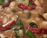 A picture of step 3 of Ulli theeyyal (shallots cooked in roasted coconut gravy and tamarind juice).