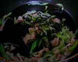 A picture of step 3 of Super Quick Dish! Shio-Kombu Buttered Pork and Japanese Leek Over Rice.