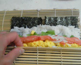 A picture of step 9 of Salad Roll (with rolling instructions).