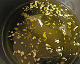 A picture of step 34 of Garlic Chips and Garlic Oil.