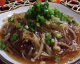 A picture of step 7 of "Family Restaurant" Style Hamburger Steaks with Enoki Mushroom Ankake Sauce.