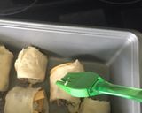 A picture of step 6 of Cheeseburger Crescent Rolls.