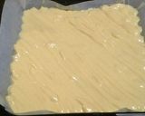 A picture of step 4 of Petit Strawberry Roll Cake with Ladyfinger Biscuit Crust.