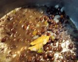 A picture of step 2 of Black Beans with Vinegar-Butter, Poached Onion.