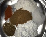 A picture of step 2 of Crispy Masala fries.