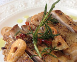 A picture of step 19 of Authentic Garlic Chicken in a Frying Pan.