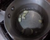A picture of step 1 of Ginger & cardamom tea.