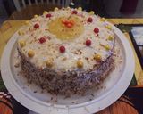 A picture of step 8 of Pineapple filled toasted coconut yellow rum cake..