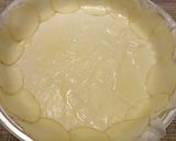 A picture of step 2 of Ham and cheese pie with a potato crust.