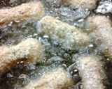 A picture of step 6 of Easy Mozerella Cheese Sticks.