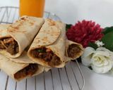 A picture of step 13 of Saucy beef wraps.