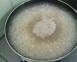 A picture of step 2 of Egg and Rice Porridge.