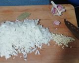 Foto del paso 2 de la receta Chipirones en su tinta con arroz blanco