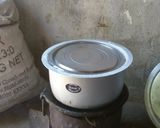 A picture of step 9 of Simple home backed oil cake without an oven.