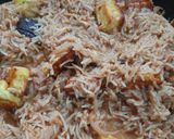 A picture of step 9 of Tomato Paneer Biryani.