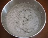 A picture of step 9 of Rich Black Sesame Roll Cake.