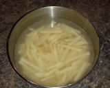 A picture of step 4 of The BEST French fries ever.