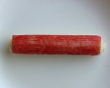 A picture of step 3 of A Cute Bento Item: Crabstick and Cheese Rolls.