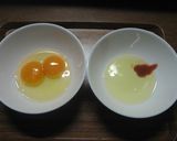 A picture of step 1 of Kyaraben Side Item Heart Tamagoyaki.