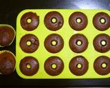 A picture of step 7 of Baked Dark Chocolate Donuts Made with Pancake Mix.
