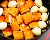 A picture of step 2 of Sweet and Salty Simmered Satsuma-Age and QuailEggs.