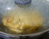 A picture of step 10 of Aloo Posto.