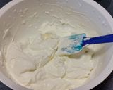 A picture of step 2 of Strawberry Jell-O Pretzel Salad.