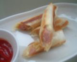 A picture of step 5 of Easy and Speedy Curry Flavored Spring Rolls.
