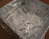 A picture of step 6 of Castella Made in a Newspaper Mold.