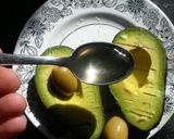 A picture of step 3 of Avocado w/ olive juice.