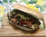 Foto del passaggio 6 della ricetta Panino ciabatta, melanzane grigliate, pomodorini secchi, filetti di alici e menta