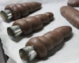 A picture of step 9 of Chocolate Filled Black Cocoa Cornets and Rolls.